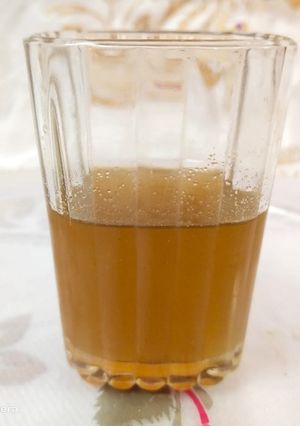 A picture of Cardamom and saunf sharbat.