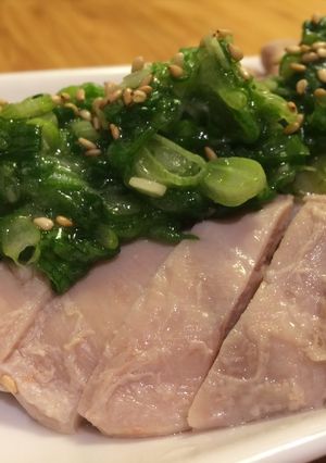 A picture of Steamed Chicken with Green Onion Sauce.