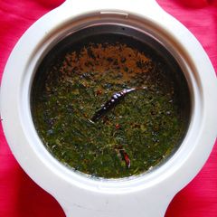 A picture of PAAT SAAG JHOL (SOUP OF JUTE LEAVES).
