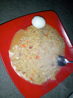 A picture of Indomie and boiled egg.