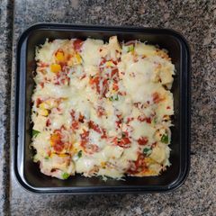 A picture of Desi Pizza Rice Delight.