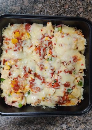 A picture of Desi Pizza Rice Delight.