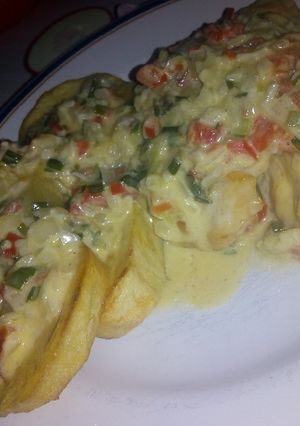 Una foto de Pollo al verdeo con papas