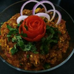 A picture of Baingan Ka Bharta (Smoky flavor egg plant bharta).