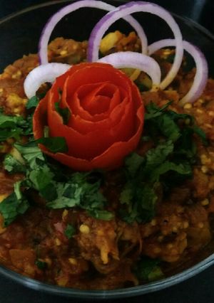 A picture of Baingan Ka Bharta (Smoky flavor egg plant bharta).