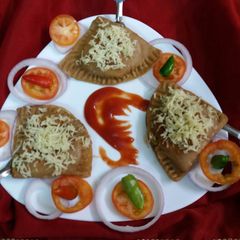 A picture of Cheese aloo paratha samosa.
