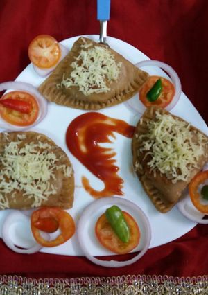 A picture of Cheese aloo paratha samosa.