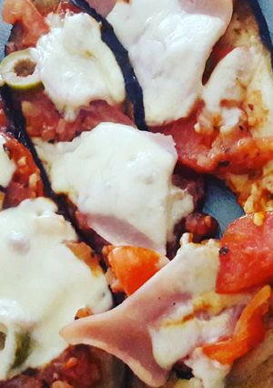 Una foto de Berenjenas a la pizza