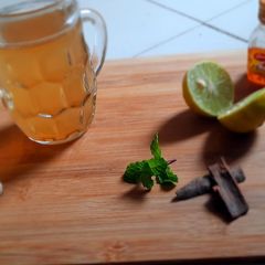 A picture of Cinnamon tea with lemon and ginger.