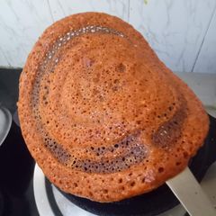 A picture of Tomato dosa.