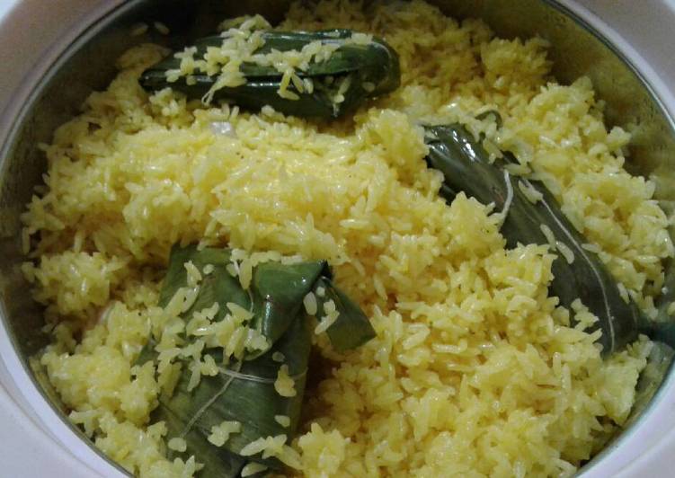 Step-by-Step Guide to Make Favorite Patauri pulao (fried rice with stuffed banana leaf envelopes)