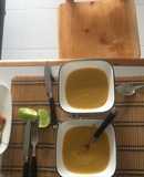 Sopa de guineo con pechuga apanada y ensalada