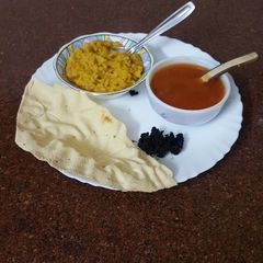 A picture of Tuar dal khichdi with soup.