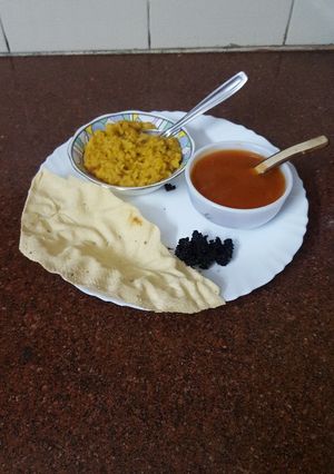 A picture of Tuar dal khichdi with soup.