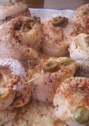 Una foto de Arrollados de Merluza a la salsa de mostaza, con arroz blanco