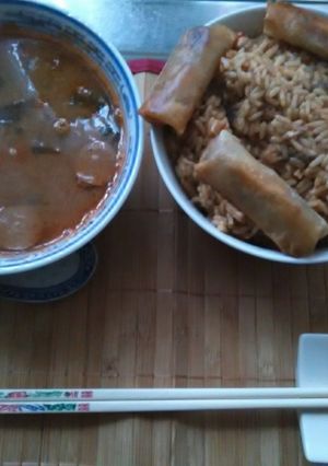 A picture of Japanese dice pork chop in gekkeikan sake rice wine. japanese sticky yakiniku sauce sezhuan spicy spring rolls egg fried rice home made.