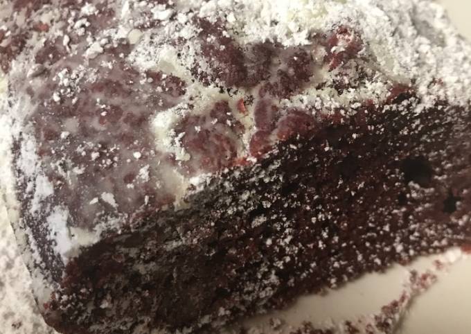 Red velvet cake with powdered sugar on top