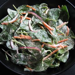 A picture of Spinach Salad with Hummus Dressing.