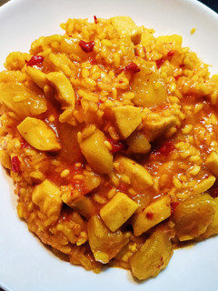 Una foto de Arroz con choco y patatas