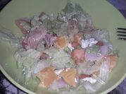 Una foto de ensalada con pomelo