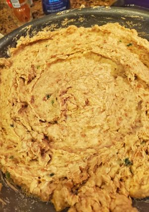 A picture of Refried beans made in a rice cooker.