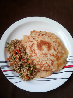 A picture of Pancake with veg sauce.