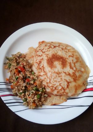 A picture of Pancake with veg sauce.