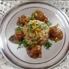 A picture of Fried Rice with Manchurian balls.
