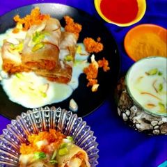 A picture of Carrot Halwa stuffed Chila with Rabdi.