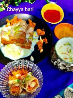A picture of Carrot Halwa stuffed Chila with Rabdi.