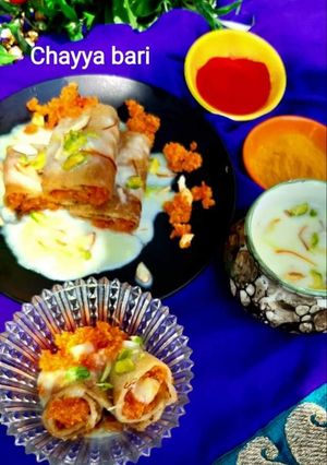 A picture of Carrot Halwa stuffed Chila with Rabdi.