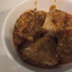 A picture of Okro soup with yam.