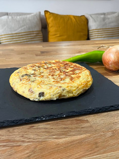 Una foto de Tortilla de pimiento y queso feta