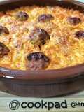 Arroz al horno con pelotitas criollas y costra de huevo