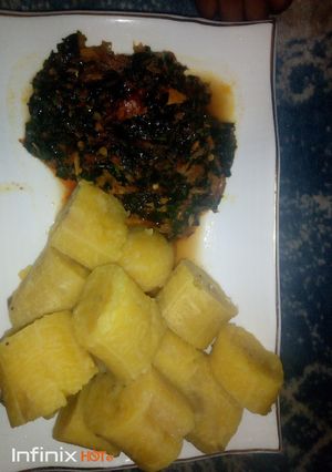 A picture of Boiled Plantain and Vegetable Sauce.