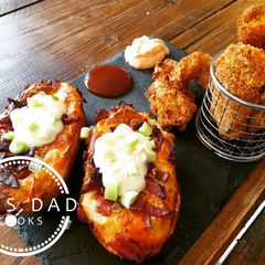 A picture of Buttermilk Crispy Chicken Tenders and Perfect Potato Skins.