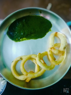 A picture of Curd rings with green chutney...