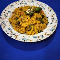 A picture of Masala vegetable khichdi -one pot healthy meal in pressure cooker.