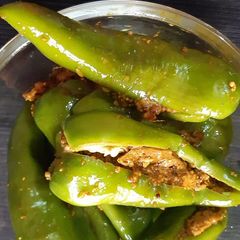 A picture of Stuffed green chilli pickle.