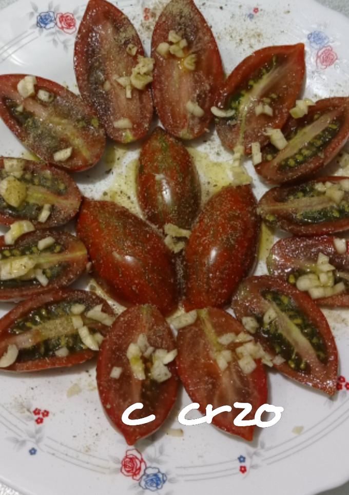 Una foto de Tomate bellota al ajillo