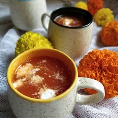 A picture of Tomato onion soup.