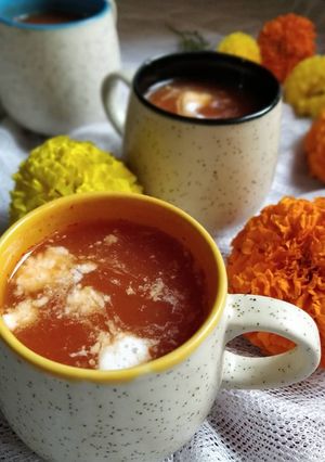 A picture of Tomato onion soup.
