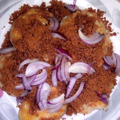 A picture of Masa with granut cake (bandashe).