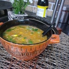 A picture of Tomato and vegetable soup.