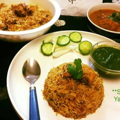 A picture of Shahi_Chicken_Korma_With_Butter_Chicken_Biryani.
