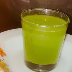 A picture of Amla curry leaves juice.
