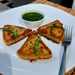 A picture of Pearl Millet Spicy Triangles.
