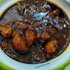 A picture of Amla ka meetha achaar (Indian gooseberry sweet pickle).