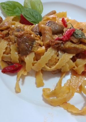 A picture of Egg Fettuccine with Caesar's Mushrooms.