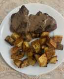 Lomo al mix de pimienta con papas y batatas al horno